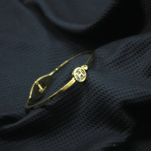 Golden Signature 'H' Medallion Cuff Bracelet - rangeeen.pk
