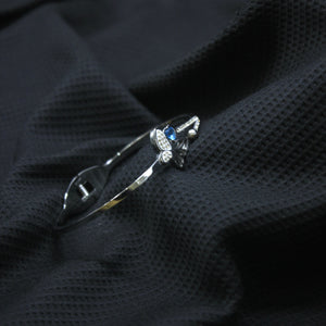 Silver-Toned Open Cuff with a Central Pave Butterfly and Blue Accents - rangeeen.pk
