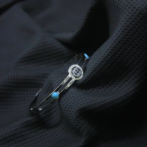 Silver Tone Vintage-Inspired Cuff with Blue Stone Detail - rangeeen.pk